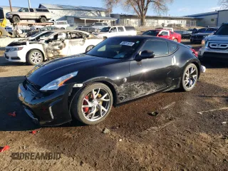 2014 Nissan 370Z Nismo z VIN JN1AZ4EHXEM632166, wystawiony jako Copart lot #88311915 z przebiegiem 18 414 mil mil oraz Szkoda całkowita • Salvage title. Historia ofert i sprzedaży dostępna na DreamBid. Obrazek 1.