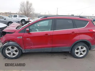2014 Ford Escape SE z VIN 1FMCU9G93EUC21873, wystawiony jako IAAI lot #41401305 z przebiegiem 222 142 mil mil oraz . Historia ofert i sprzedaży dostępna na DreamBid. Obrazek 13.