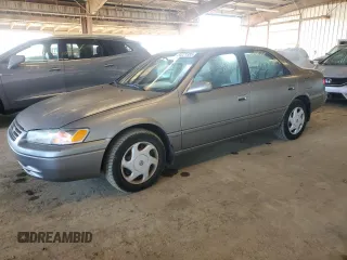 1998 Toyota Camry LE z VIN JT2BF28K1W0118987, wystawiony jako Copart lot #50221385 z przebiegiem 198 976 mil mil oraz Czysty tytuł • Clean title. Historia ofert i sprzedaży dostępna na DreamBid. Obrazek 1.