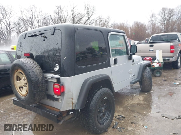 2006 Jeep Wrangler Sport Right Hand Drive with VIN 1J4F449SX6P764491, listed as a IAAI auction lot 41709726 with 290,798 mi miles. Bid and sale history available at carsss.com. Image 4.