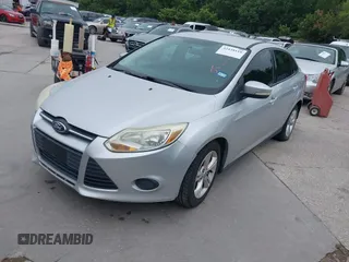 2013 Ford Focus SE z VIN 1FADP3F25DL189133, wystawiony jako IAAI lot #42438118 z przebiegiem 122 350 mil mil oraz . Historia ofert i sprzedaży dostępna na DreamBid. Obrazek 2.