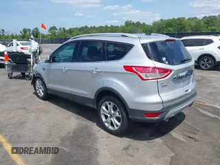 2014 Ford Escape Titanium with VIN 1FMCU0JX7EUA28824, listed as a IAAI auction lot 42065325 with 107,761 mi miles. Bid and sale history available at carsss.com. Image 3.