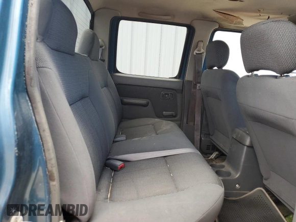 2001 Nissan Frontier SE with VIN 1N6ED27T91C390230, listed as a Copart auction lot 58844905 with 157,883 mi miles and Salvage title. Bid and sale history available at DreamBid. Image 10.