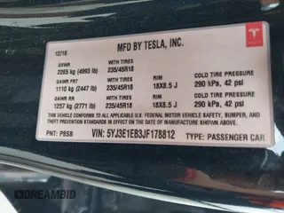 2018 Tesla Model 3 Long Range Battery z VIN 5YJ3E1EB3JF178812, wystawiony jako IAAI lot #42124838 z przebiegiem 124 229 mil mil oraz . Historia ofert i sprzedaży dostępna na DreamBid. Obrazek 9.