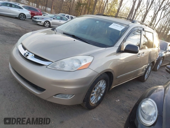 2007 Toyota Sienna XLE with VIN 5TDZK22C97S062721, listed as a IAAI auction lot 41900786 with 220,189 mi miles. Bid and sale history available at carsss.com. Image 2.