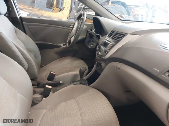 2015 Hyundai Accent GLS with VIN KMHCT4AE8FU876771, listed as a IAAI auction lot 42007229 with 63,484 mi miles. Bid and sale history available at carsss.com. Image 5.