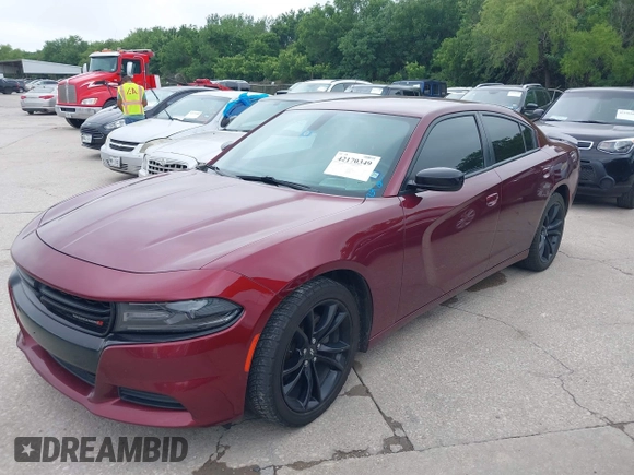 2017 Dodge Charger SE with VIN 2C3CDXBG2HH539722, listed as a IAAI auction lot 42170349 with 186,762 mi miles and . Bid and sale history available at carsss.com. Image 2.