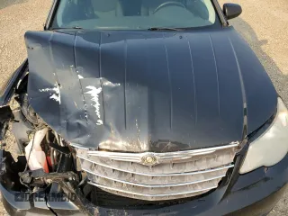 2009 Chrysler Sebring Touring z VIN 1C3LC56D69N531168, wystawiony jako Copart lot #59331415 z przebiegiem 225 463 mil mil oraz Szkoda całkowita • Salvage title. Historia ofert i sprzedaży dostępna na DreamBid. Obrazek 11.