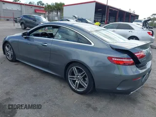 2018 Mercedes-Benz E 400 with VIN WDD1J6FB9JF015064, listed as a IAAI auction lot 42165914 with 95,290 mi miles and . Bid and sale history available at DreamBid. Image 3.