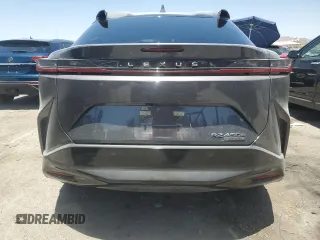 2023 Lexus RZ 450e Premium z VIN JTJAAAAB7PA010338, wystawiony jako Copart lot #59992004 z przebiegiem 10 040 mil mil oraz Szkody całkowita. Historia ofert i sprzedaży dostępna na DreamBid. Obrazek 6.