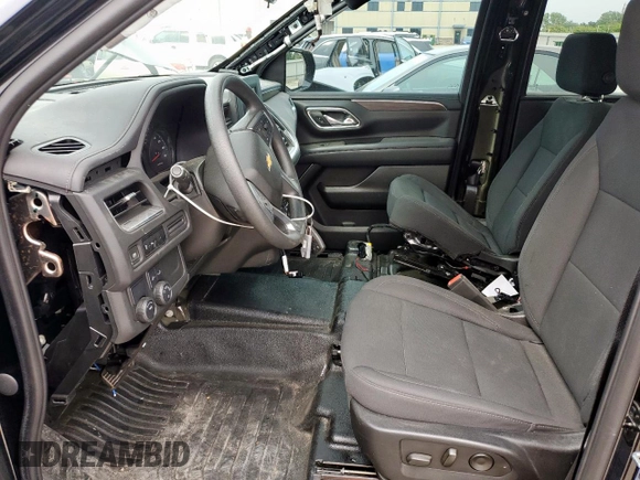 2023 Chevrolet Tahoe Commercial with VIN 1GNSCLED7PR428027, listed as a Copart auction lot 56738455 with 6,599 mi miles and Salvage title. Bid and sale history available at DreamBid. Image 7.