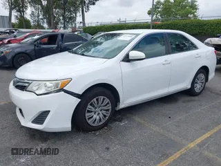2014 Toyota Camry L with VIN 4T1BF1FK4EU403013, listed as a IAAI auction lot 42115089 with 221,686 mi miles and . Bid and sale history available at DreamBid. Image 17.