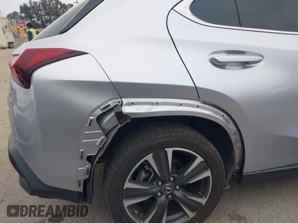 2023 Lexus UX 250h with VIN JTHX6JBH6P2143926, listed as a IAAI auction lot 42180779 with 65,106 mi miles and . Bid and sale history available at DreamBid. Image 6.