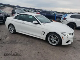 2015 BMW 4 Series 428i xDrive with VIN WBA3T1C52FP819767, listed as a Copart auction lot 82695004 with 71,648 mi miles and Salvage Title. Bid and sale history available at carsss.com. Image 4.