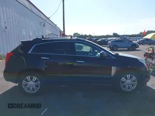 2016 Cadillac SRX Luxury Collection with VIN 3GYFNEE39GS532145, listed as a IAAI auction lot 42670496 with 193,959 mi miles and . Bid and sale history available at DreamBid. Image 13.
