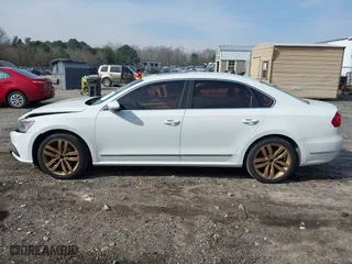 2016 Volkswagen Passat 1.8T SEL with VIN 1VWCT7A39GC057485, listed as a IAAI auction lot 41797043 with 82,632 mi miles. Bid and sale history available at carsss.com. Image 14.