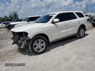 2012 Dodge Durango SXT with VIN 1C4RDHAG0CC329788, listed as a Copart auction lot 61101745 with 208,302 mi miles and Salvage title. Bid and sale history available at DreamBid. Image 1.