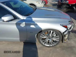 2019 Infiniti Q50 Luxe z VIN JN1EV7AP4KM518705, wystawiony jako IAAI lot #40957491 z przebiegiem 49 576 mil mil oraz . Historia ofert i sprzedaży dostępna na DreamBid. Obrazek 19.