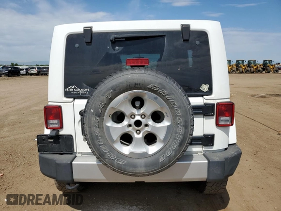 2014 Jeep Wrangler Unlimited Sahara with VIN 1C4BJWEG1EL210949, listed as a Copart auction lot 60977555 with 122,495 mi miles and Salvage title. Bid and sale history available at DreamBid. Image 6.