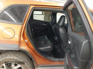 2015 Jeep Cherokee Trailhawk with VIN 1C4PJMBS5FW524462, listed as a IAAI auction lot 41774347 with 107,592 mi miles. Bid and sale history available at carsss.com. Image 8.