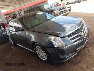 2011 Cadillac CTS Luxury with VIN 1G6DF5EY6B0104932, listed as a IAAI auction lot 42032457 with 165,833 mi miles and . Bid and sale history available at DreamBid. Image 1.