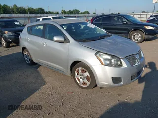 2009 Pontiac Vibe 1SA with VIN 5Y2SP678X9Z473576, listed as a IAAI auction lot 42709951 with 165,434 mi miles and . Bid and sale history available at DreamBid. Image 1.
