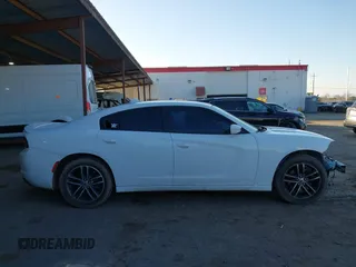 2019 Dodge Charger SXT with VIN 2C3CDXJG1KH533323, listed as a IAAI auction lot 41369282 with 102,467 mi miles and . Bid and sale history available at DreamBid. Image 14.