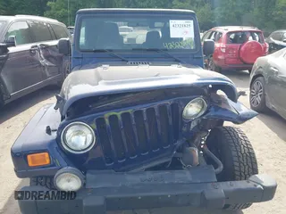 2006 Jeep Wrangler X with VIN 1J4FA39S36P763346, listed as a IAAI auction lot 42321825 with 104,077 mi miles and . Bid and sale history available at DreamBid. Image 12.