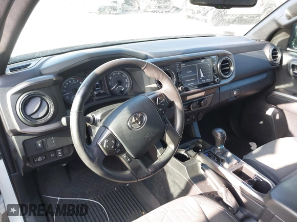 2023 Toyota Tacoma SR5 z VIN 3TMAZ5CNXPM208862, wystawiony jako IAAI lot #42206860 z przebiegiem 11 354 mil mil oraz . Historia ofert i sprzedaży dostępna na DreamBid. Obrazek 22.