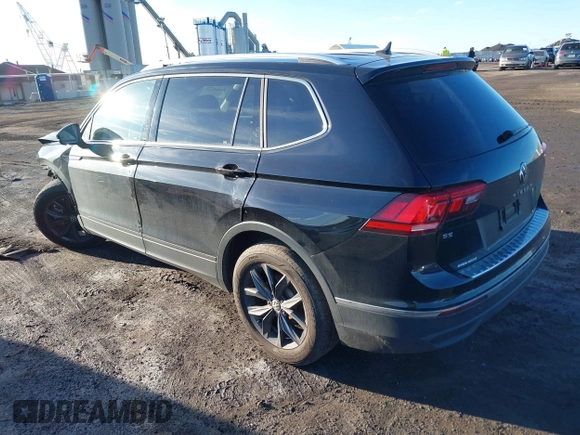 2023 Volkswagen Tiguan SE with VIN 3VVMB7AX8PM032557, listed as a IAAI auction lot 41585975 with 28,706 mi miles and . Bid and sale history available at DreamBid. Image 3.