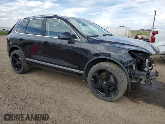 2015 Volkswagen Touareg Sport with VIN WVGEF9BP3FD004771, listed as a Copart auction lot 58668125 with 64,422 mi miles and Clean title. Bid and sale history available at DreamBid. Image 4.