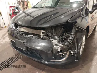 2020 Chrysler Pacifica Touring L with VIN 2C4RC1BG9LR140072, listed as a IAAI auction lot 42199118 with 93,557 mi miles and . Bid and sale history available at DreamBid. Image 6.