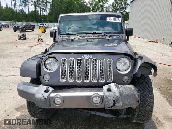 2016 Jeep Wrangler Unlimited Sahara с VIN 1C4BJWEG5GL221827, выставлен на аукционе Copart как лот 60411625 с пробегом 65 405 миль миль и Списание • Salvage title. История ставок и продаж доступна на DreamBid. Изображение 5.