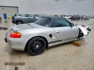2002 Porsche Boxster S with VIN WP0CB29802S660218, listed as a Copart auction lot 62540525 with 129,940 mi miles and Salvage title. Bid and sale history available at DreamBid. Image 3.