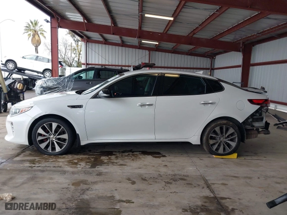 2017 Kia Optima SX with VIN 5XXGW4L2XHG136843, listed as a IAAI auction lot 41806606 with 157,899 mi miles. Bid and sale history available at carsss.com. Image 14.