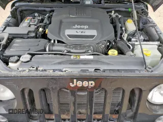 2016 Jeep Wrangler Black Bear with VIN 1C4AJWAG6GL332985, listed as a Copart auction lot 55244945 with 76,661 mi miles and Salvage title. Bid and sale history available at DreamBid. Image 12.