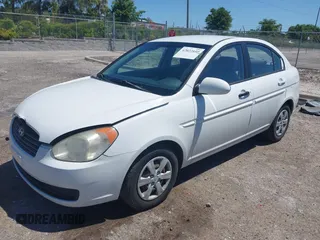2009 Hyundai Accent Auto GLS with VIN KMHCN46C29U331834, listed as a IAAI auction lot 42027159 with 68,527 mi miles. Bid and sale history available at carsss.com. Image 2.