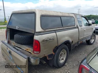 2000 Ford F-150 XL z VIN 2FTRX18L4YCA00725, wystawiony jako IAAI lot #42741630 z przebiegiem Nie podano mil oraz . Historia ofert i sprzedaży dostępna na DreamBid. Obrazek 4.