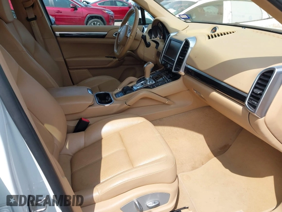2014 Porsche Cayenne with VIN WP1AA2A21ELA94214, listed as a IAAI auction lot 42389334 with 114,276 mi miles and . Bid and sale history available at DreamBid. Image 5.