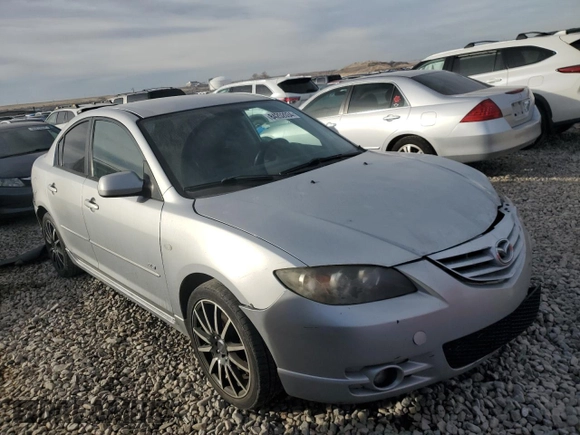 2006 Mazda 3 s with VIN JM1BK324261542255, listed as a Copart auction lot 84252034 with 196,030 mi miles and Salvage Title. Bid and sale history available at DreamBid. Image 4.