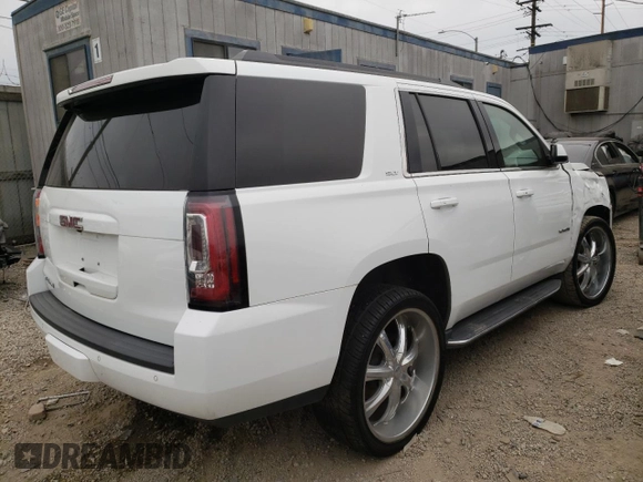 2017 GMC Yukon SLT with VIN 1GKS2BKC9HR125757, listed as a Copart auction lot 73427934 with 72,333 mi miles and Salvage Title. Bid and sale history available at carsss.com. Image 3.