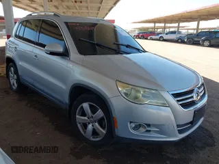 2010 Volkswagen Tiguan SEL with VIN WVGAV7AX9AW514577, listed as a IAAI auction lot 42318019 with 165,364 mi miles and . Bid and sale history available at DreamBid. Image 1.