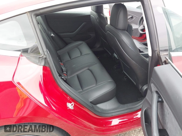 2018 Tesla Model 3 Long Range Battery z VIN 5YJ3E1EB8JF119898, wystawiony jako IAAI lot #42297445 z przebiegiem 29 555 mil mil oraz . Historia ofert i sprzedaży dostępna na DreamBid. Obrazek 8.