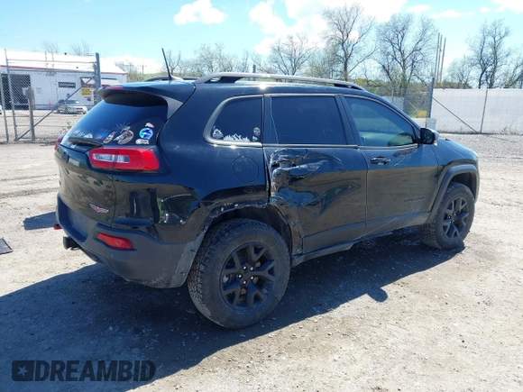 2018 Jeep Cherokee Trailhawk Leather Plus with VIN 1C4PJMBXXJD572667, listed as a IAAI auction lot 42216477 with 85,890 mi miles and . Bid and sale history available at DreamBid. Image 4.
