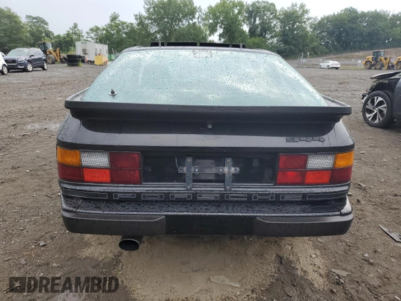 1987 Porsche 944 z VIN WP0AB0946HN474232, wystawiony jako Copart lot #64654684 z przebiegiem 87 126 mil mil oraz Szkoda całkowita • Salvage title. Historia ofert i sprzedaży dostępna na DreamBid. Obrazek 6.