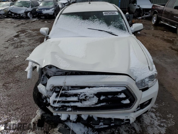 2021 Toyota Tacoma SR z VIN 3TYSZ5AN0MT009231, wystawiony jako Copart lot #49252665 z przebiegiem Nie podano mil oraz Szkoda całkowita • Salvage title. Historia ofert i sprzedaży dostępna na DreamBid. Obrazek 11.