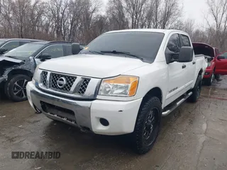 2011 Nissan Titan SL with VIN 1N6AA0EC8BN317497, listed as a IAAI auction lot 41443597 with 202,622 mi miles. Bid and sale history available at carsss.com. Image 2.