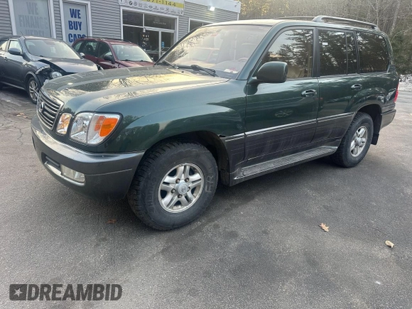 2000 Lexus LX 470 z VIN JT6HT00W5Y0105585, wystawiony jako Copart lot #49099395 z przebiegiem 153 695 mil mil oraz Czysty tytuł • Clean title. Historia ofert i sprzedaży dostępna na DreamBid. Obrazek 2.