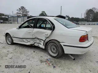 1997 BMW 5 Series 528i with VIN WBADD5321VBV51708, listed as a Copart auction lot 86942384 with 0 mi miles and Salvage Title. Bid and sale history available at carsss.com. Image 2.