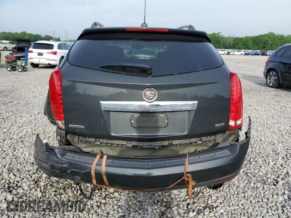 2016 Cadillac SRX Luxury Collection z VIN 3GYFNBE3XGS570448, wystawiony jako Copart lot #54517475 z przebiegiem 119 540 mil mil oraz Szkoda całkowita • Salvage title. Historia ofert i sprzedaży dostępna na DreamBid. Obrazek 6.